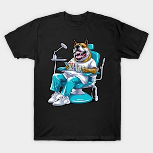 An English Bulldog sitting in front of a dentist's chair, wearing a blue surgical mask T-Shirt